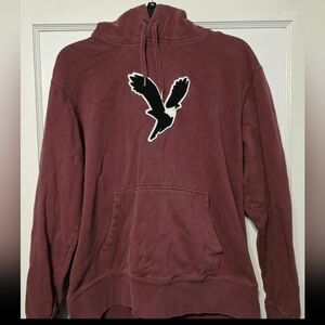 American Eagle Outfitters Burgundy Hoodie with Bird Emblem